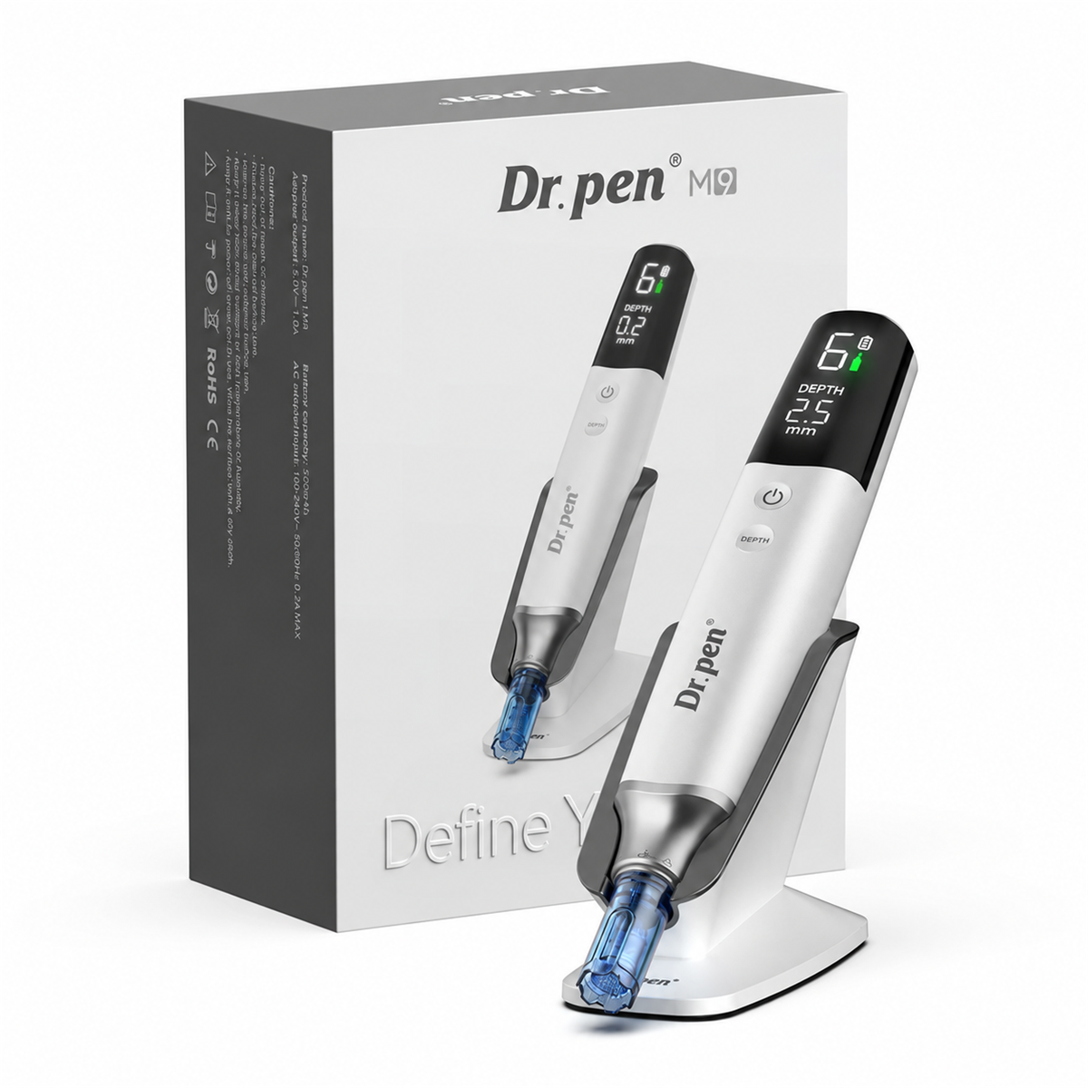 Witte Dr. Pen M9 op de standaard naast de originele productdoos